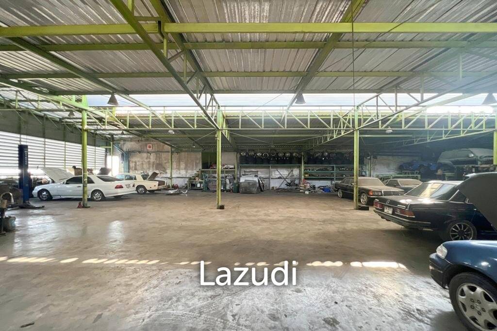 Prime Corner Showroom for Car Dealership or Business with Heavy-Duty Lift and Ample Parking