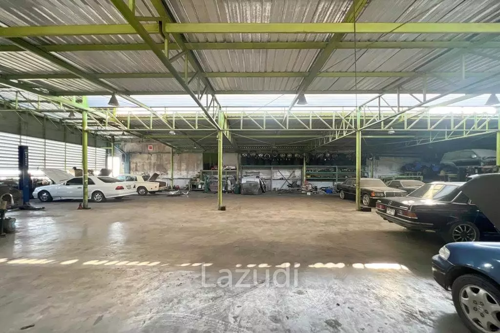 Prime Corner Showroom for Car Dealership or Business with Heavy-Duty Lift and Ample Parking