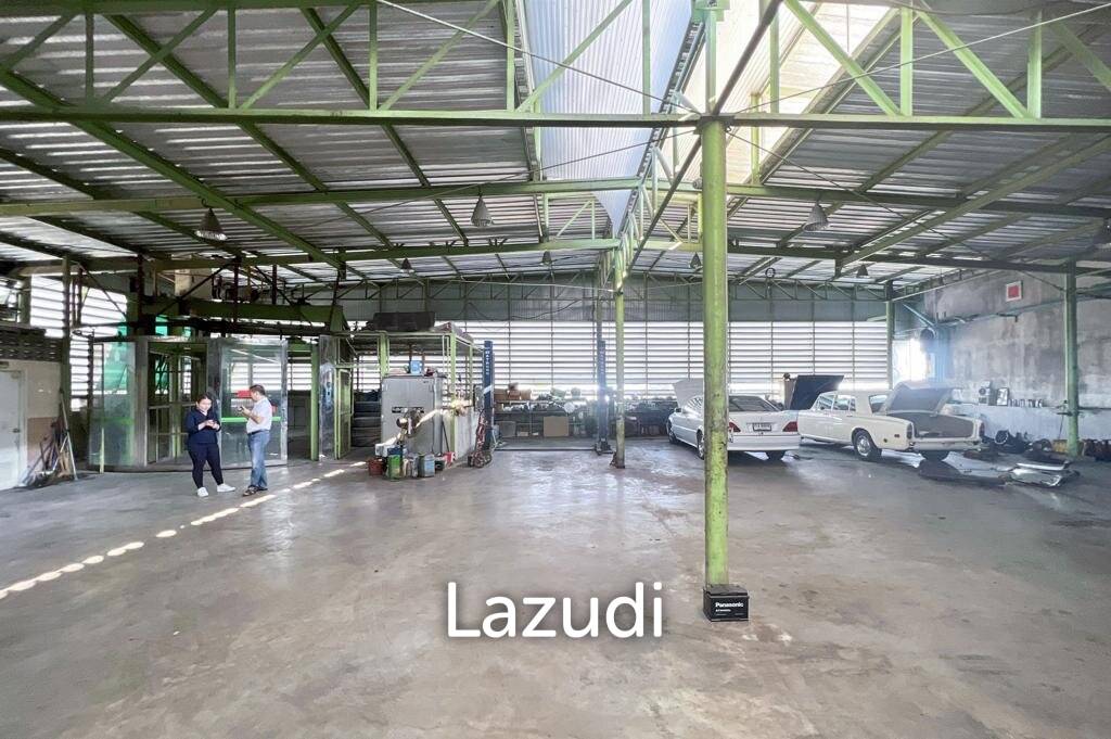 Prime Corner Showroom for Car Dealership or Business with Heavy-Duty Lift and Ample Parking