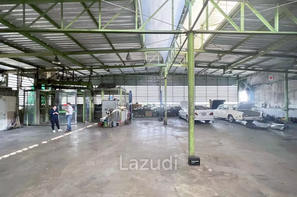 Prime Corner Showroom for Car Dealership or Business with Heavy-Duty Lift and Ample Parking