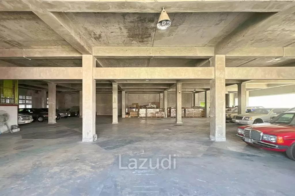 Prime Corner Showroom for Car Dealership or Business with Heavy-Duty Lift and Ample Parking