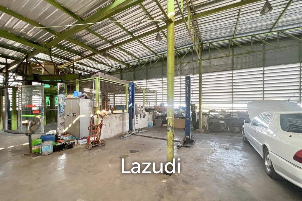 Prime Corner Showroom for Car Dealership or Business with Heavy-Duty Lift and Ample Parking