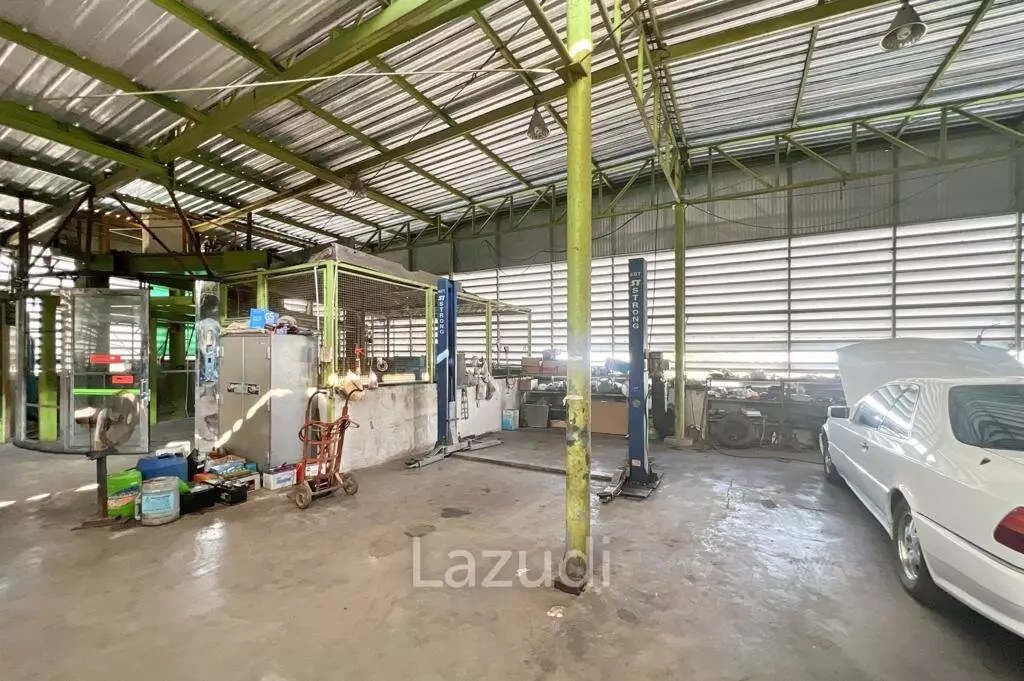 Prime Corner Showroom for Car Dealership or Business with Heavy-Duty Lift and Ample Parking