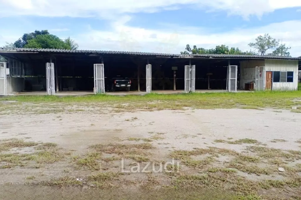 Sell/Rent 7 rai land close to the main road.