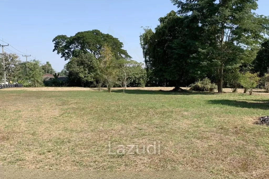 Sell/Rent 7 rai land close to the main road.