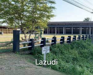 Sell/Rent 7 rai land close to the main road.