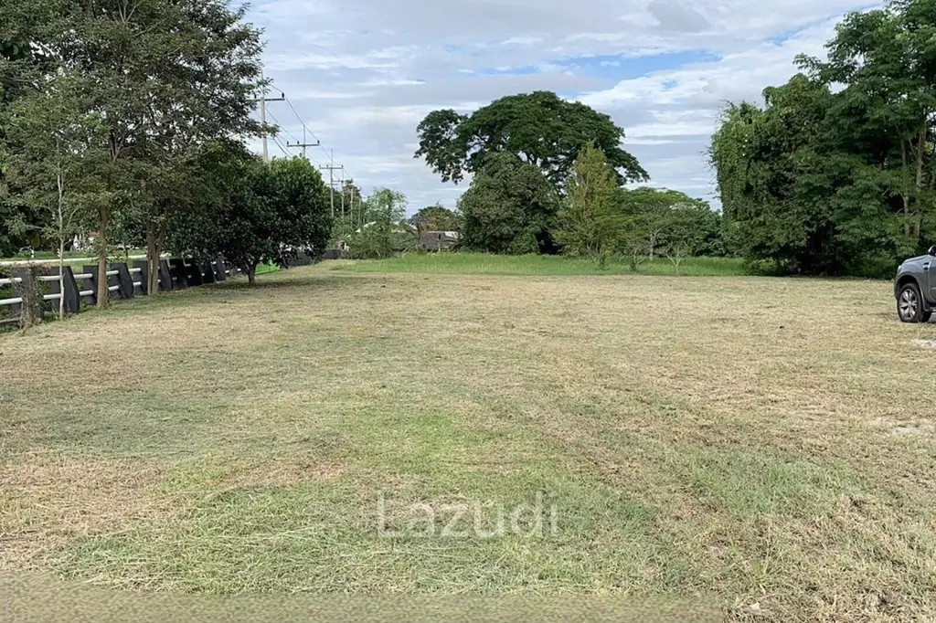 Sell/Rent 7 rai land close to the main road.