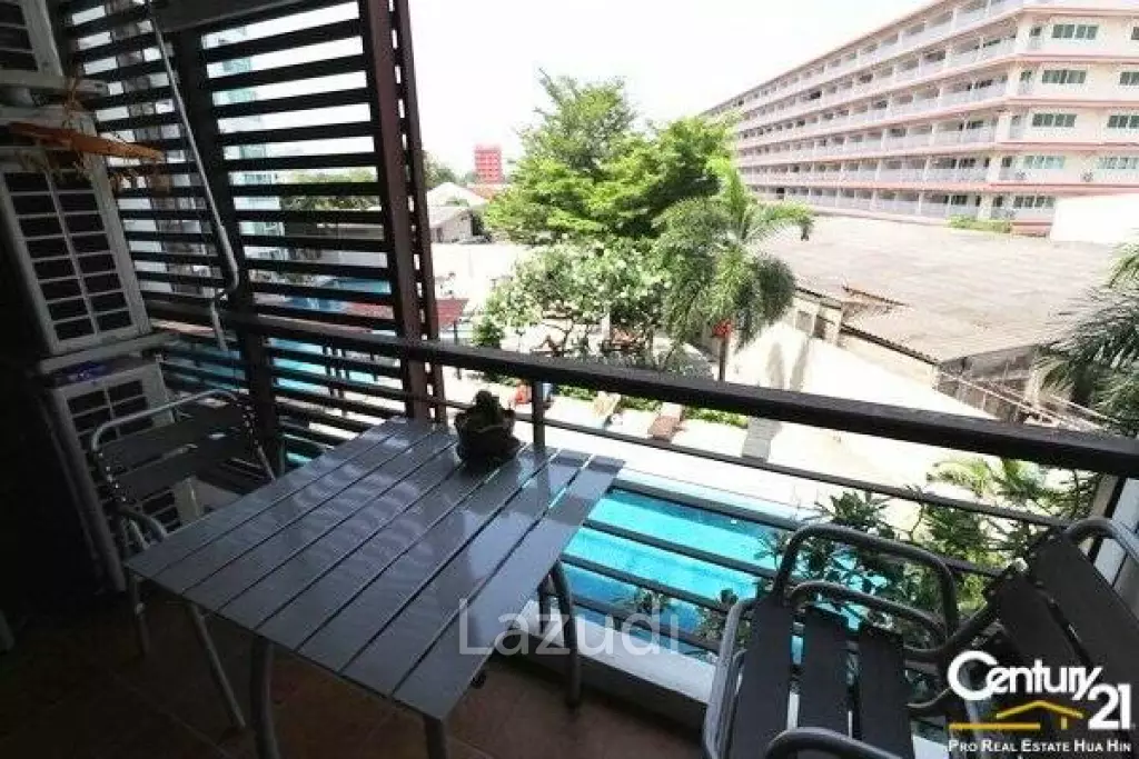2 Bed with Pool View Condo in Town
