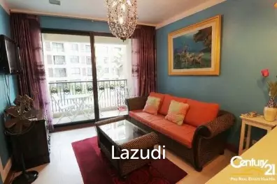 1 Bed Condo with Pool View in Town