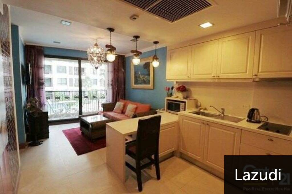 1 Bed Condo with Pool View in Town