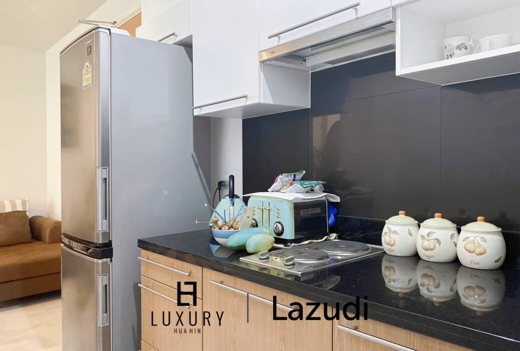 The Breeze Condo: 1 Bedroom With Pool View