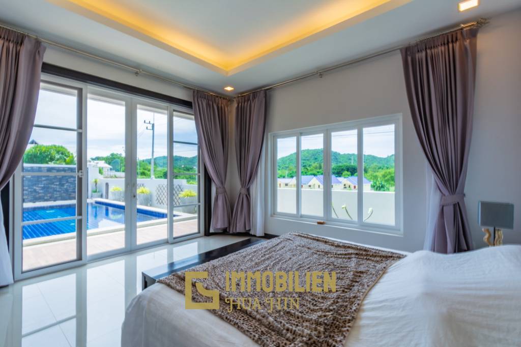Emerald Scenery: 3 Schlafzimmer Pool Villa mit Blick auf den Banyan Golfplatz