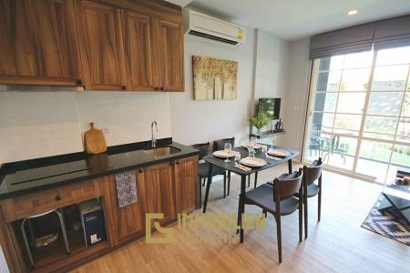 Autumn Condominium: 1 Schlafzimmer-Eigentumswohnung im Erdgeschoss mit Gartenblick