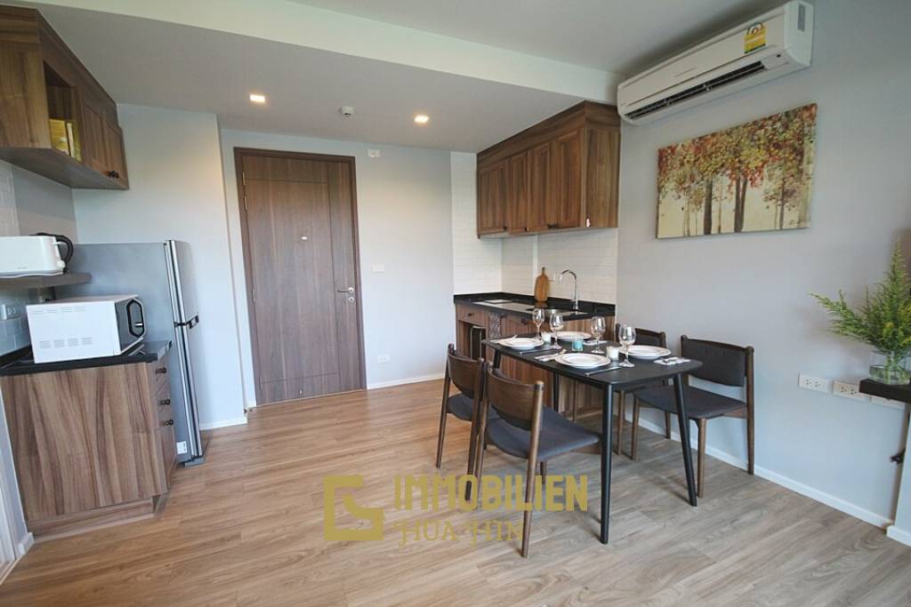 Autumn Condominium: 1 Schlafzimmer-Eigentumswohnung im Erdgeschoss mit Gartenblick