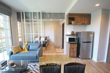 Autumn Condominium: 1 Schlafzimmer-Eigentumswohnung im Erdgeschoss mit Gartenblick