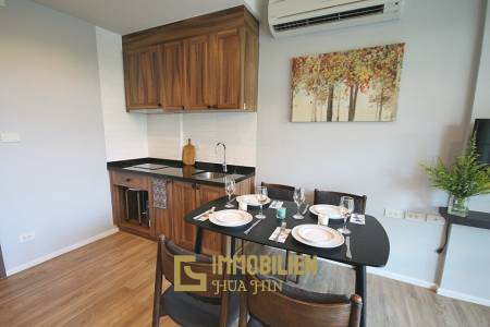Autumn Condominium: 1 Schlafzimmer-Eigentumswohnung im Erdgeschoss mit Gartenblick