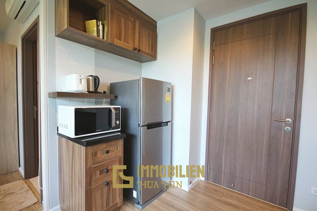 Autumn Condominium: 1 Schlafzimmer-Eigentumswohnung im Erdgeschoss mit Gartenblick