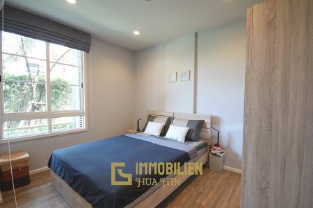 Autumn Condominium: 1 Schlafzimmer-Eigentumswohnung im Erdgeschoss mit Gartenblick