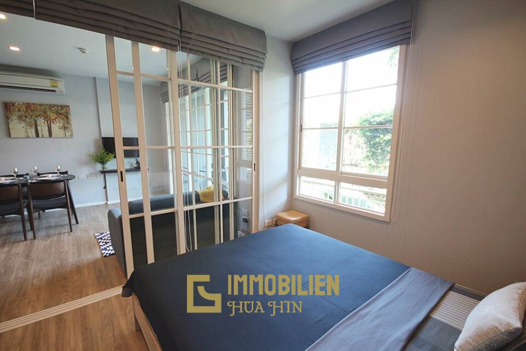 Autumn Condominium: 1 Schlafzimmer-Eigentumswohnung im Erdgeschoss mit Gartenblick