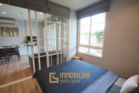 Autumn Condominium: 1 Schlafzimmer-Eigentumswohnung im Erdgeschoss mit Gartenblick