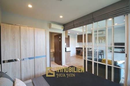 Autumn Condominium: 1 Schlafzimmer-Eigentumswohnung im Erdgeschoss mit Gartenblick
