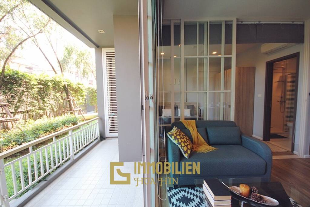 Autumn Condominium: 1 Schlafzimmer-Eigentumswohnung im Erdgeschoss mit Gartenblick