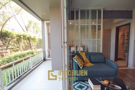 Autumn Condominium: 1 Schlafzimmer-Eigentumswohnung im Erdgeschoss mit Gartenblick