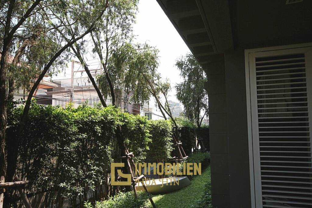 Autumn Condominium: 1 Schlafzimmer-Eigentumswohnung im Erdgeschoss mit Gartenblick