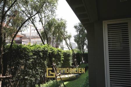 Autumn Condominium: 1 Schlafzimmer-Eigentumswohnung im Erdgeschoss mit Gartenblick