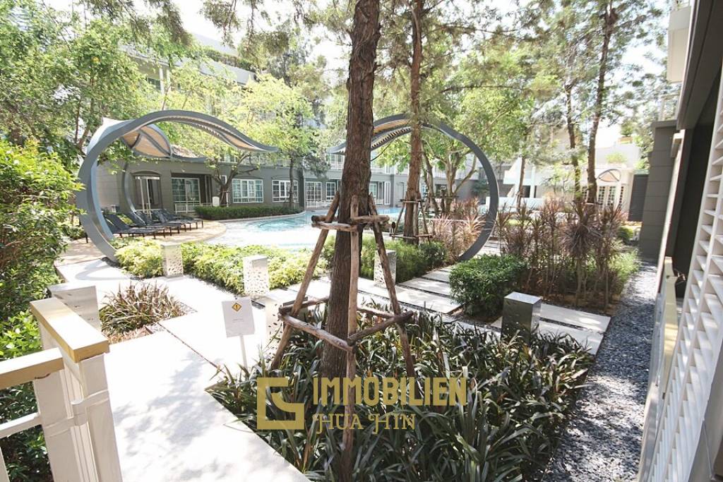 Autumn Condominium: 1 Schlafzimmer-Eigentumswohnung im Erdgeschoss mit Gartenblick