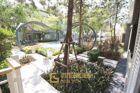 Autumn Condominium: 1 Schlafzimmer-Eigentumswohnung im Erdgeschoss mit Gartenblick