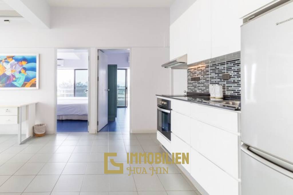 Blue Wave Condominium: 2 Schlafzimmer-Eigentumswohnung mit Meer- und Bergblick