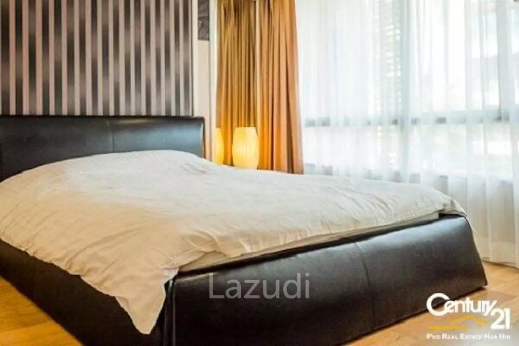 1 Bed Condo with Pool View in Town