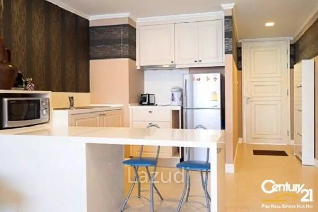1 Bed Condo with Pool View in Town