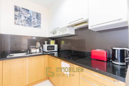 The Breeze condo: Preiswerte 1 Schlafzimmer-Eigentumswohnung mit Poolblick