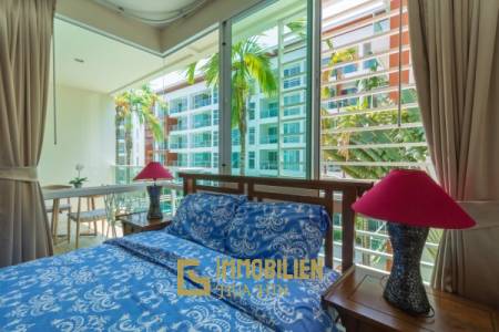 The Breeze condo: Preiswerte 1 Schlafzimmer-Eigentumswohnung mit Poolblick