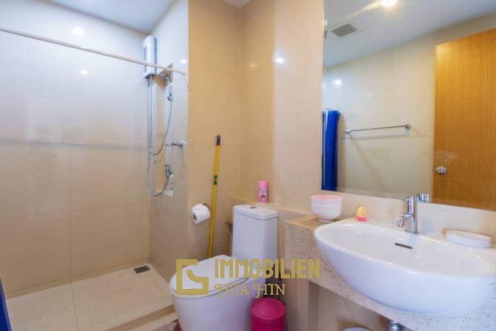 The Breeze condo: Preiswerte 1 Schlafzimmer-Eigentumswohnung mit Poolblick