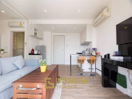 Summer: 1 Schlafzimmer-Eigentumswohnung mit Poolblick