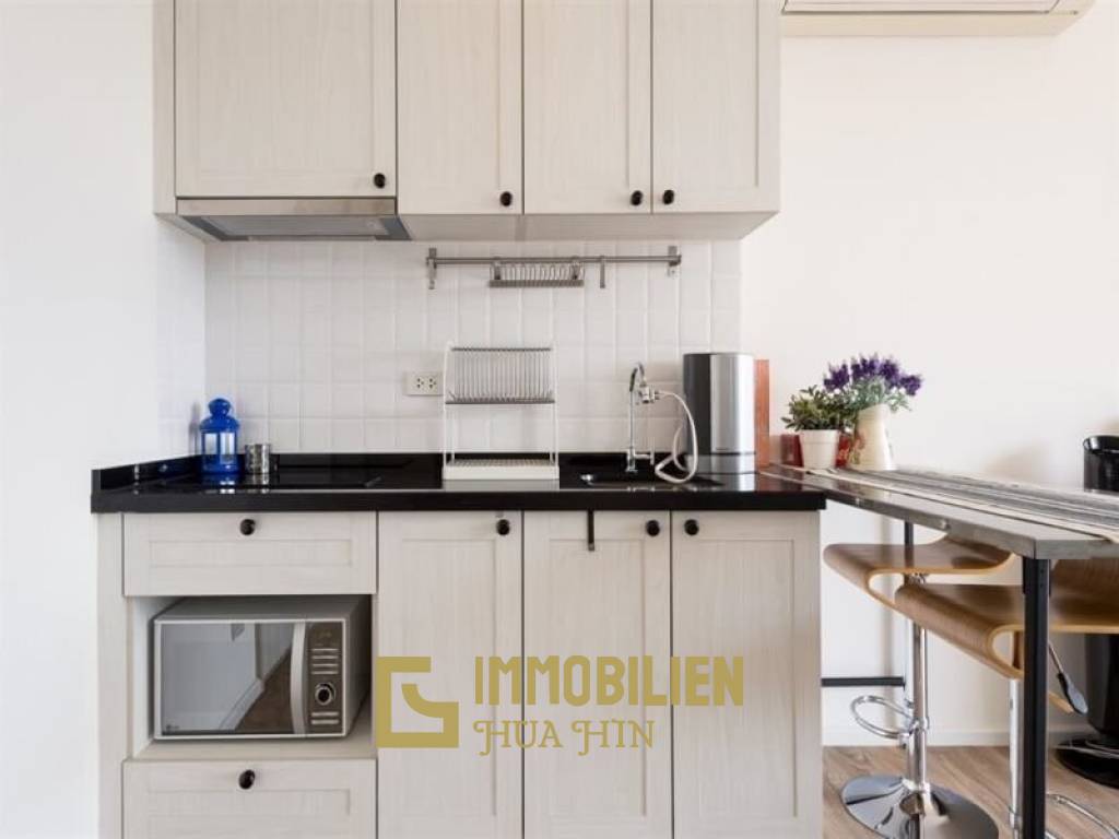 Summer: 1 Schlafzimmer-Eigentumswohnung mit Poolblick