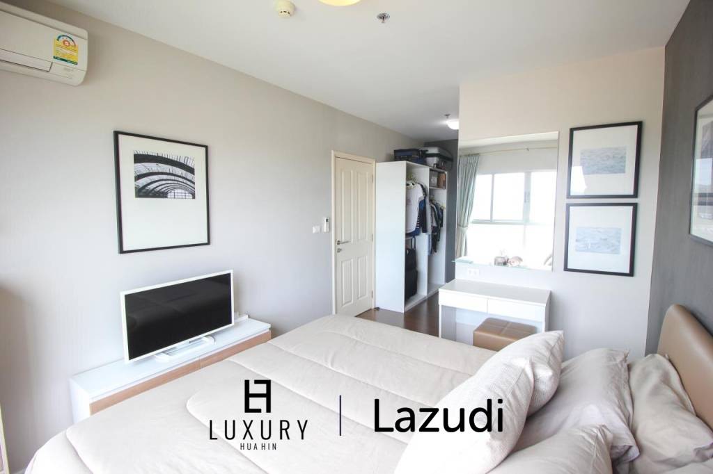 Corner 2 Bedroom City And Sea View Condo For Sale At Baan Kiang Fah