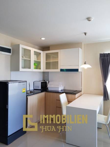 The Condo 88: 1 Schlafzimmer-Eigentumswohnung in guter Lage