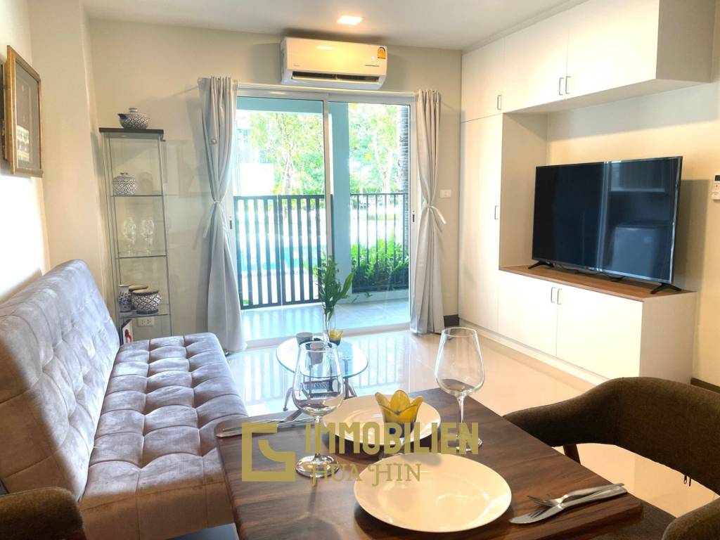 My Style Condo: 1-Schlafzimmer-Eigentumswohnung mit direktem Poolzugang