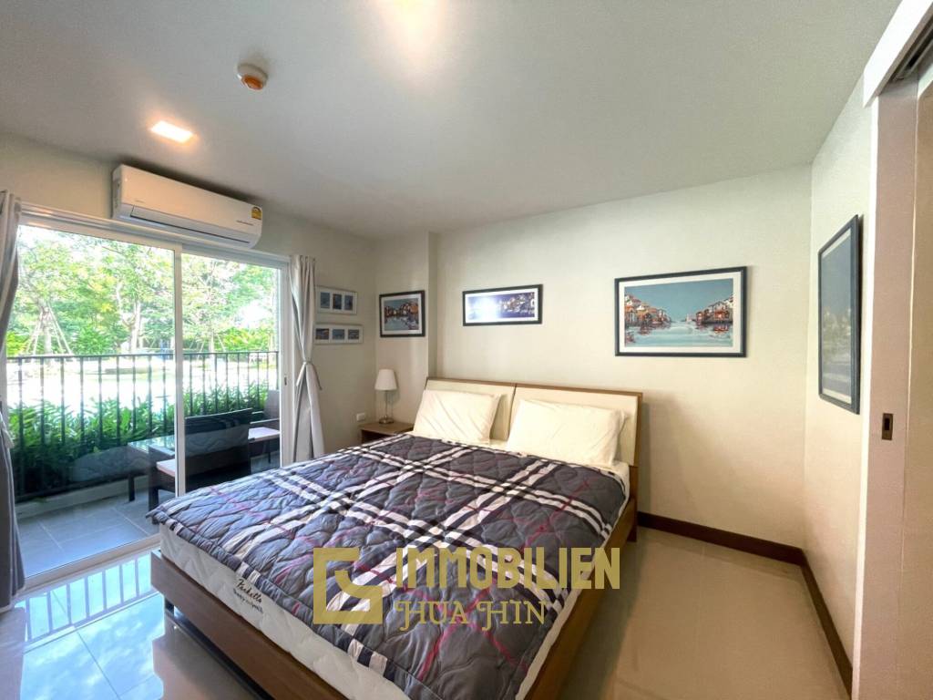 My Style Condo: 1-Schlafzimmer-Eigentumswohnung mit direktem Poolzugang