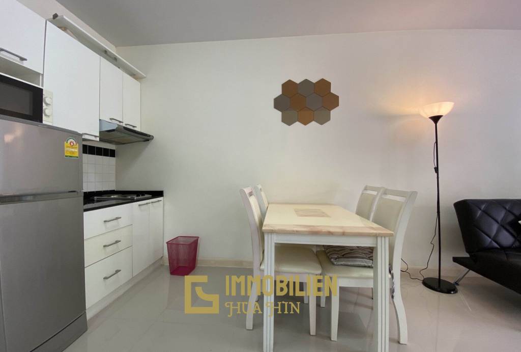 Flame Tree Residence: 1-Schlafzimmer-Eigentumswohnung in der Stadt
