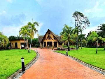 9500 SQ.M Land Plot with 3 Houses in Sattahip