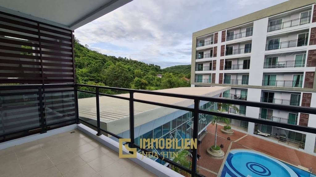 88 Condo: Vollständig möblierte Eigentumswohnung mit 1 Schlafzimmer und 1 Badezimmer mit Blick auf die Stadt