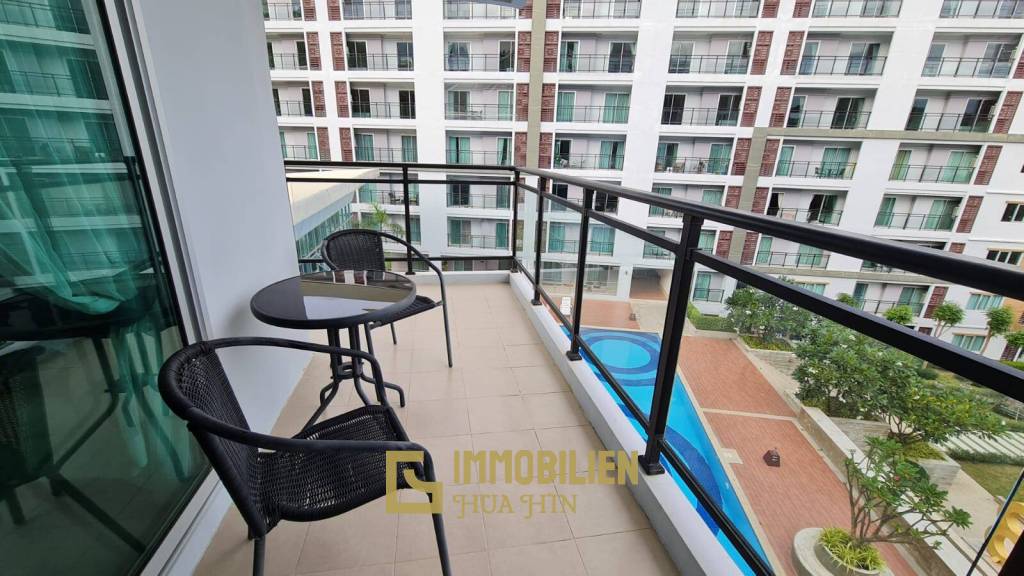 88 Condo: Vollständig möblierte Eigentumswohnung mit 1 Schlafzimmer und 1 Badezimmer mit Blick auf die Stadt