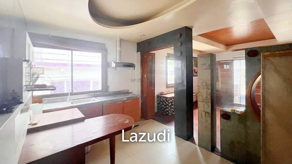 This is a three- storey building four-story property offering a distinct separation for tenants