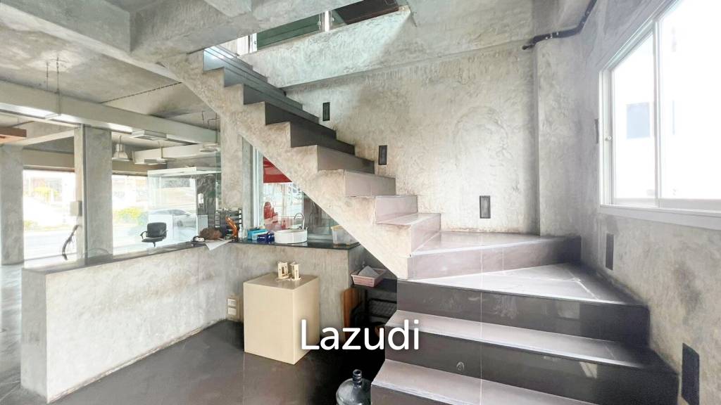 This is a three- storey building four-story property offering a distinct separation for tenants
