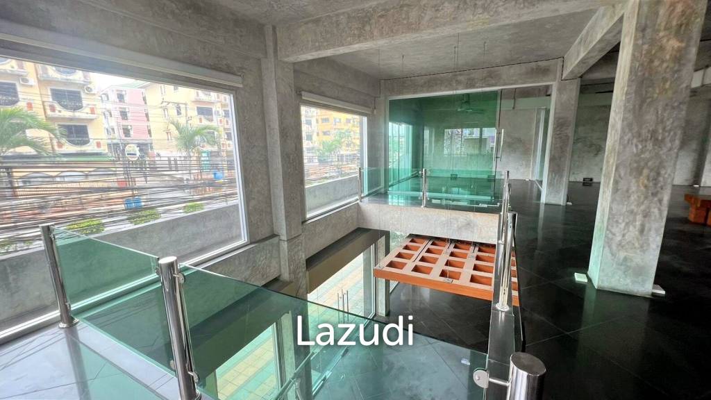This is a three- storey building four-story property offering a distinct separation for tenants